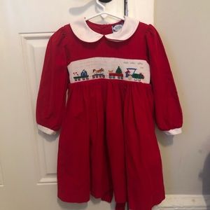 Red corduroy Christmas dress with train and toy embroidery